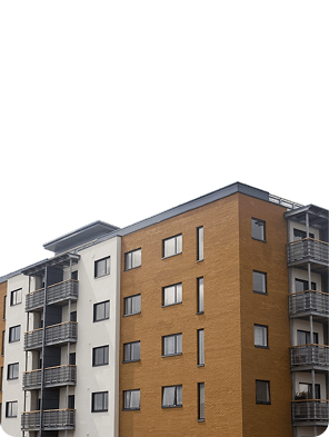 Modern apartment tower at dusk