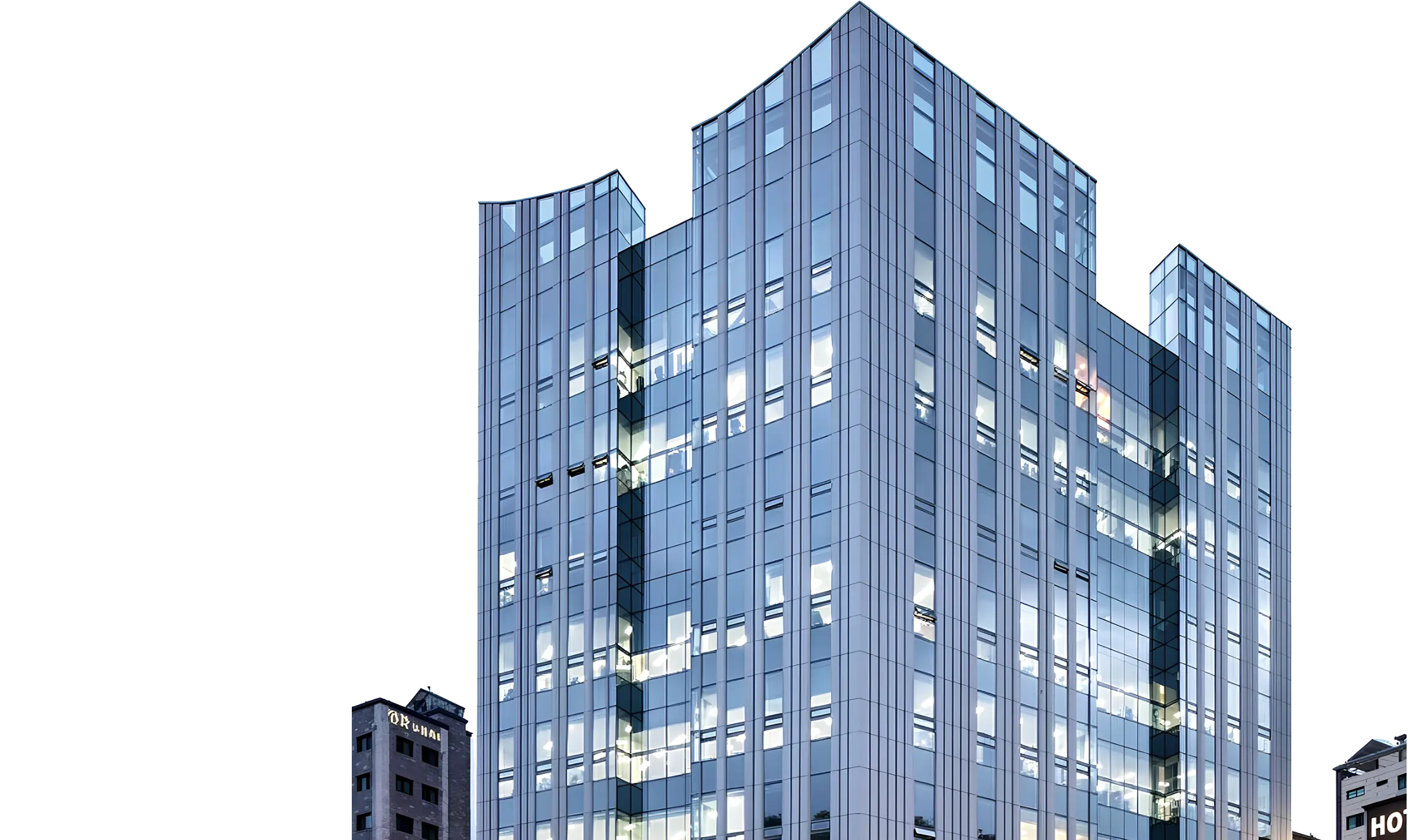 Wide green land plots and dirt road